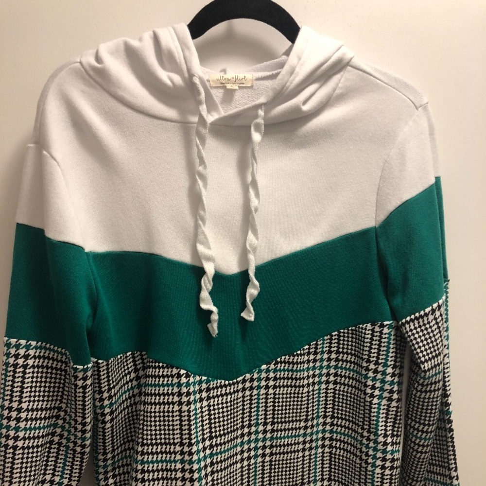 White black and green sweatshirt.